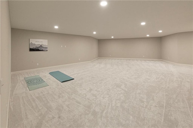 spare room with light carpet