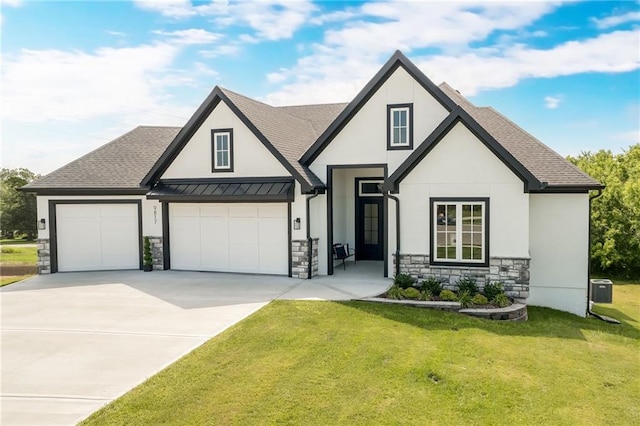 modern farmhouse style home with a front yard and a garage