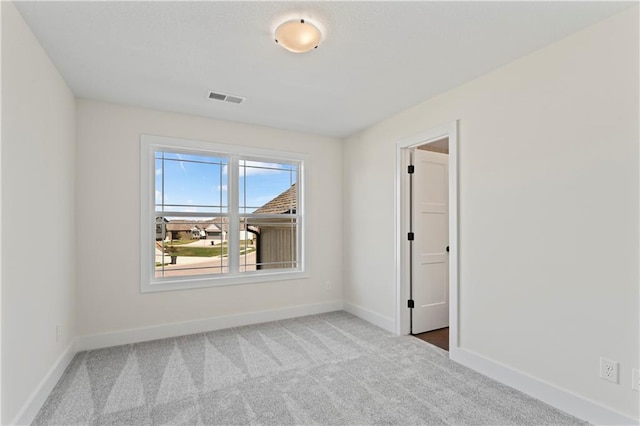 7075 NW Magnus Ct, Parkville, MO 64152 - carpeted spare room with baseboards