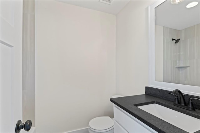 7075 NW Magnus Ct, Parkville, MO 64152 - full bathroom featuring toilet, vanity, and a shower