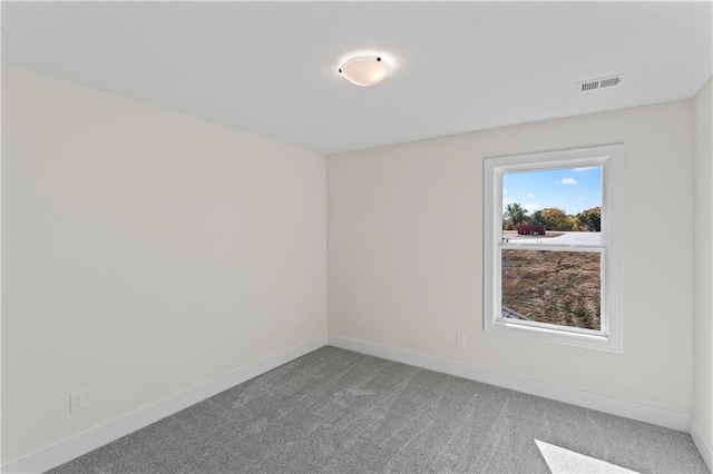 7075 NW Magnus Ct, Parkville, MO 64152 - carpeted spare room featuring baseboards