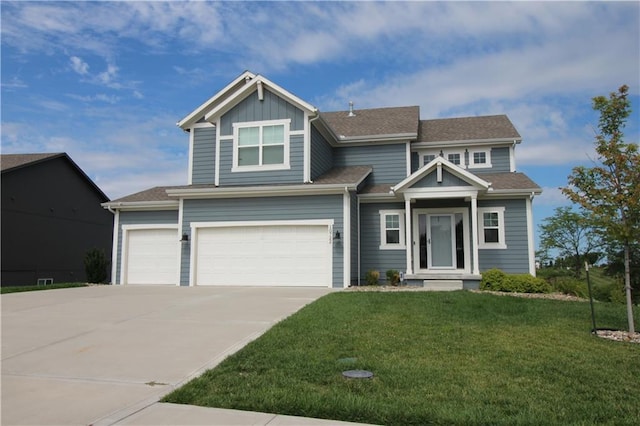 craftsman-style house with a garage and a front yard