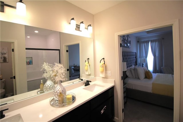 bathroom with vanity and toilet