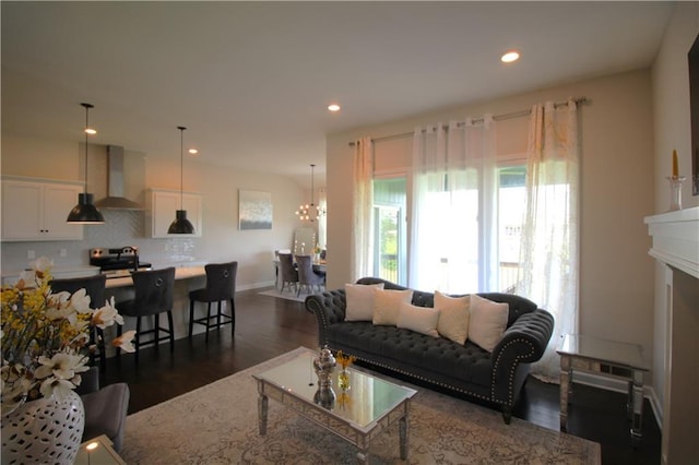 living room with dark hardwood / wood-style floors