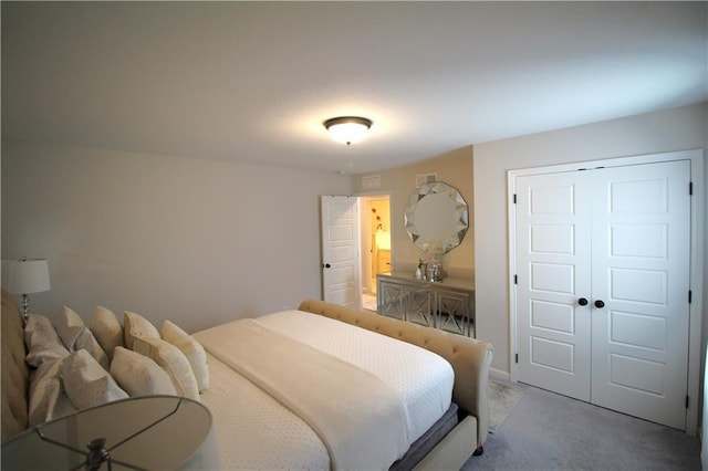 carpeted bedroom featuring a closet