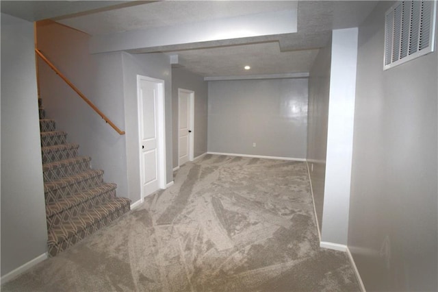 basement with carpet flooring