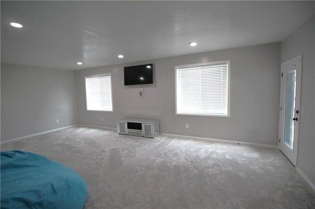 living room with light colored carpet