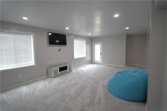 unfurnished living room with carpet flooring