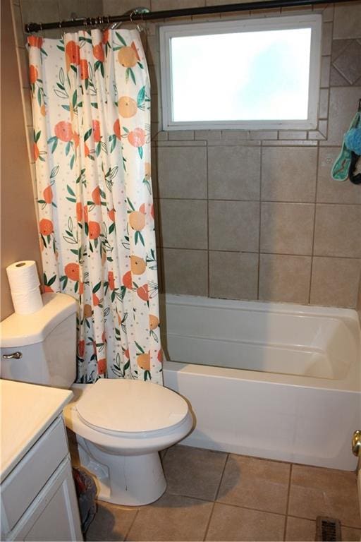 full bathroom with vanity, toilet, shower / bath combo, and tile patterned flooring