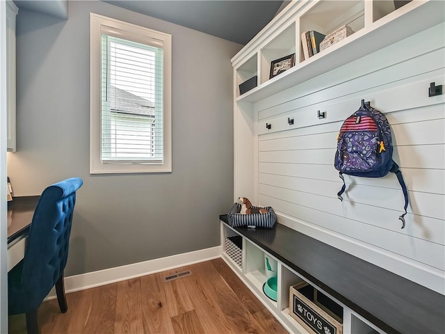 17212 Nieman Rd, Overland Park, KS 66221 - mudroom with baseboards and wood finished floors