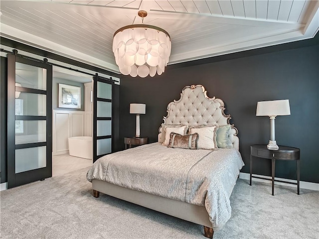 17212 Nieman Rd, Overland Park, KS 66221 - bedroom featuring carpet, a barn door, wood ceiling, and baseboards