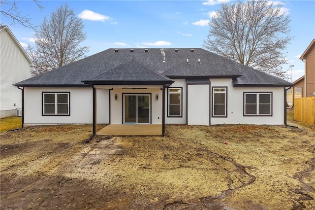 rear view of property featuring a patio area