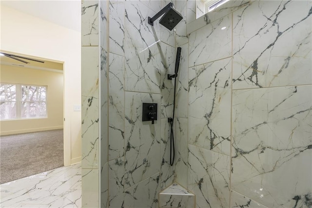 bathroom with tiled shower