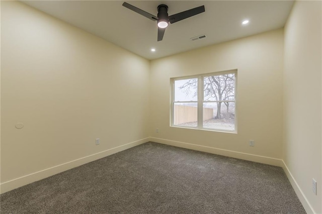 empty room featuring recessed lighting, ceiling fan, baseboards, visible vents, and dark carpet