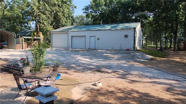 garage with a carport