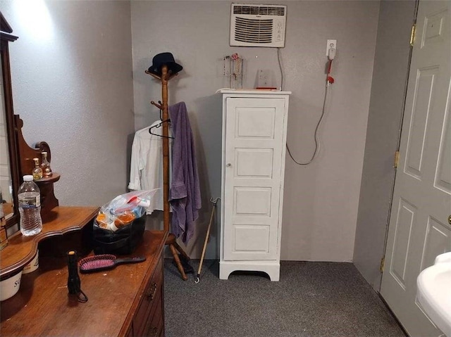 bathroom featuring an AC wall unit