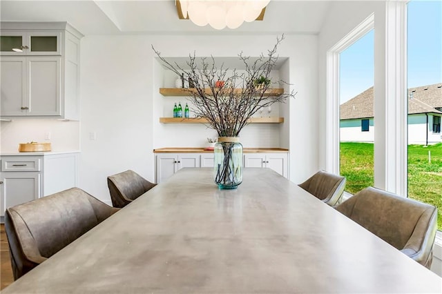 dining space featuring wood finished floors