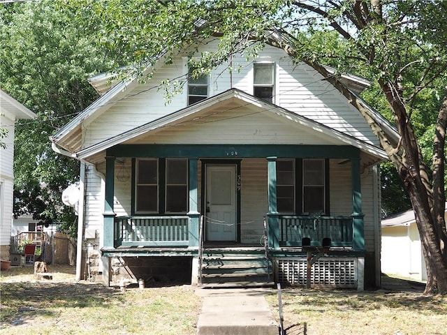 bungalow-style home featuring a porch