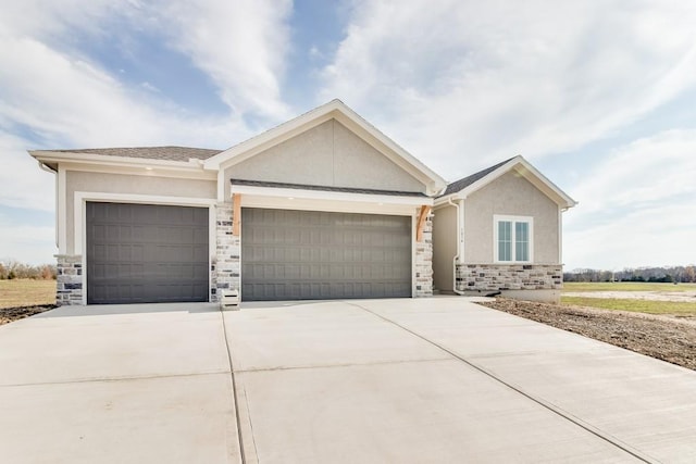 ranch-style home featuring a garage