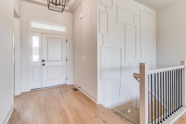 foyer entrance featuring light wood-type flooring