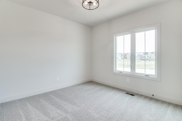 empty room featuring carpet flooring