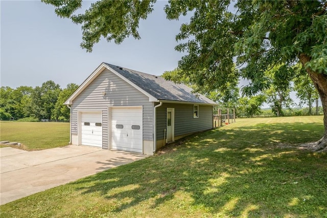 garage with a lawn