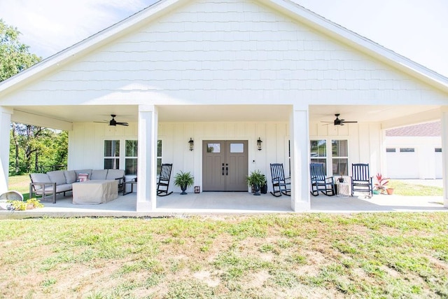 rear view of property featuring an outdoor hangout area, ceiling fan, and covered porch