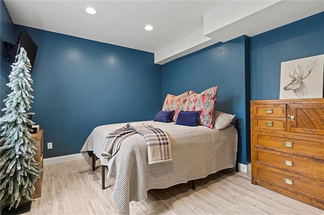 bedroom featuring light hardwood / wood-style floors