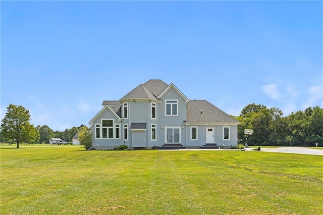 view of front of property with a front lawn