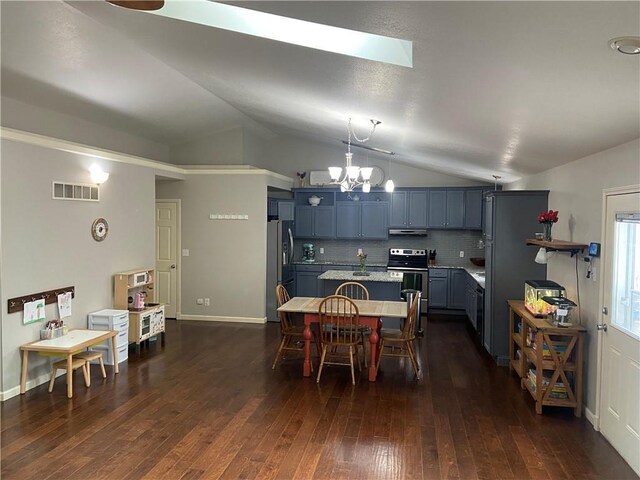 dining space featuring lofted ceiling, an inviting chandelier, visible vents, and dark wood-style flooring