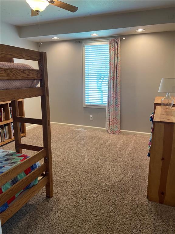 carpeted bedroom with recessed lighting and baseboards