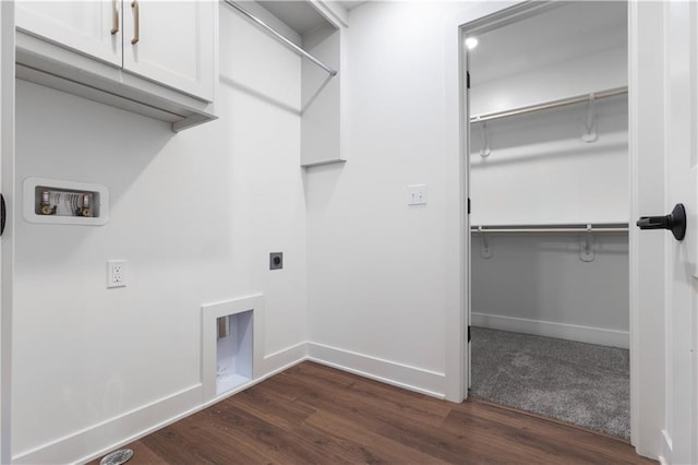 clothes washing area with cabinets, hookup for an electric dryer, dark wood-type flooring, and washer hookup