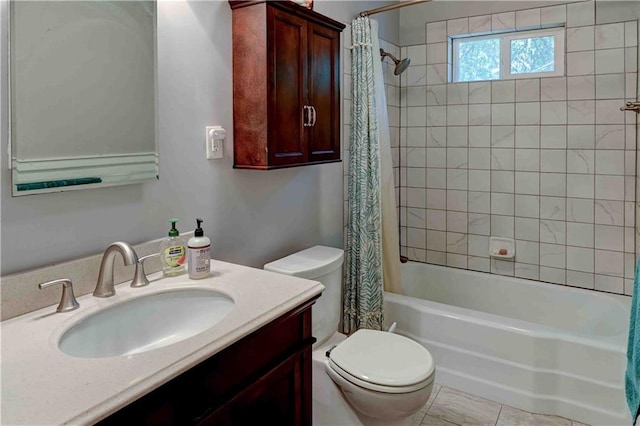 full bathroom with tile patterned floors, shower / bath combination with curtain, toilet, and vanity