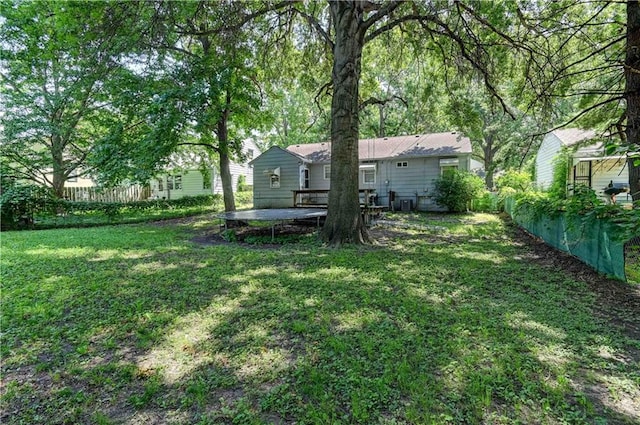 view of yard featuring a wooden deck