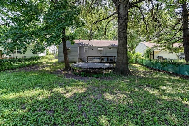 view of yard with a trampoline