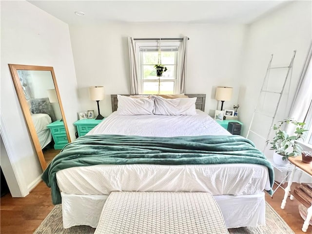 bedroom featuring wood-type flooring