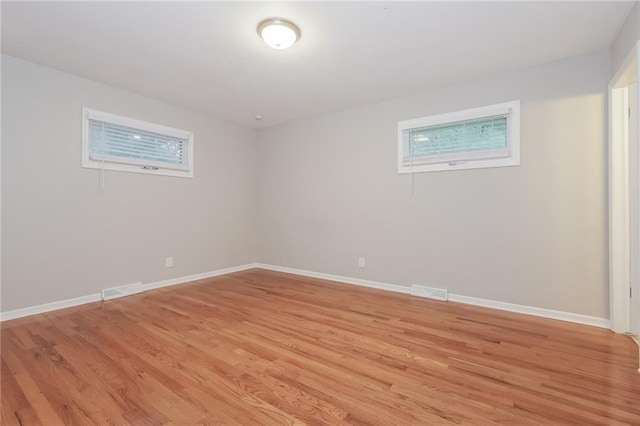 basement featuring light hardwood / wood-style floors