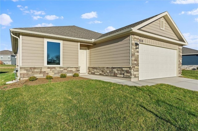 ranch-style house featuring a front yard and a garage