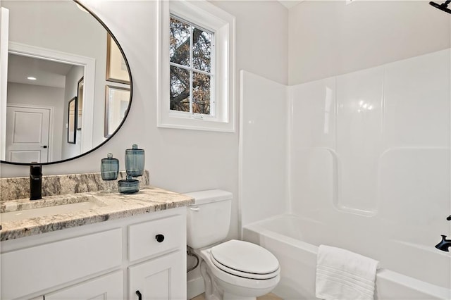 full bath featuring toilet, shower / tub combination, and vanity