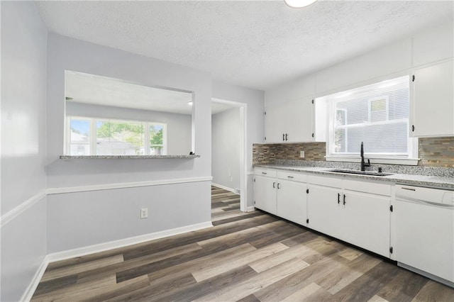 kitchen featuring white cabinetry, dark wood finished floors, and dishwasher