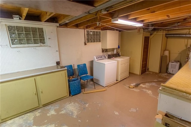 basement featuring washing machine and dryer