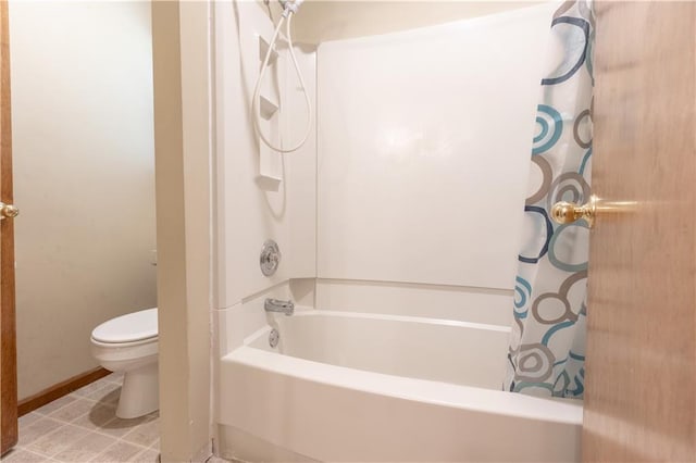 bathroom with toilet and shower / bathtub combination with curtain