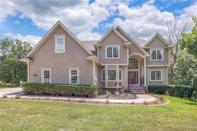 view of front of home with a front yard