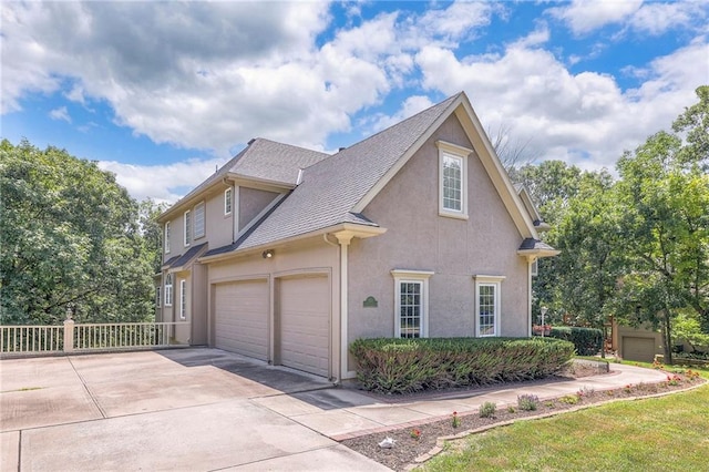 view of property exterior with a garage