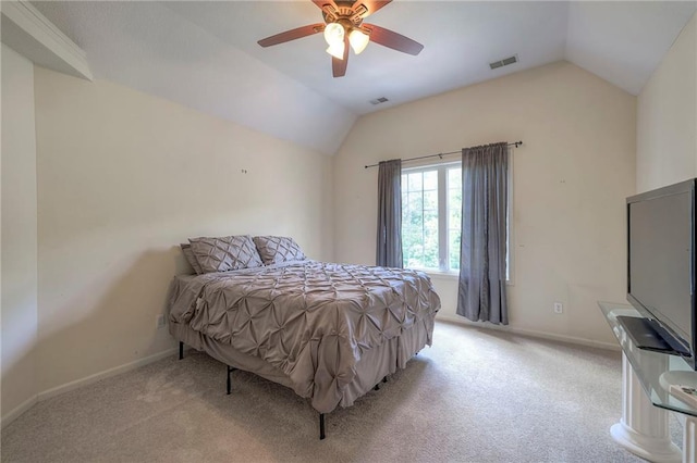 carpeted bedroom featuring lofted ceiling and ceiling fan