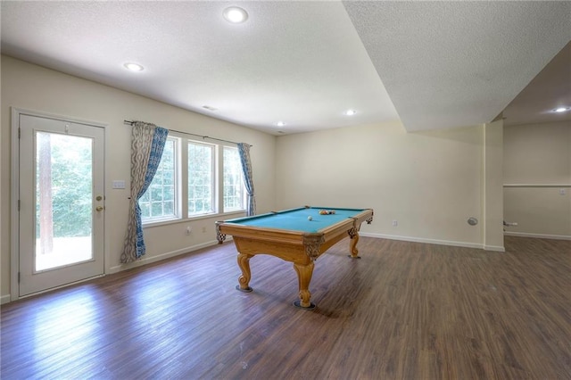 rec room with pool table, dark hardwood / wood-style floors, and a textured ceiling