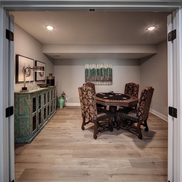 dining room featuring light hardwood / wood-style floors