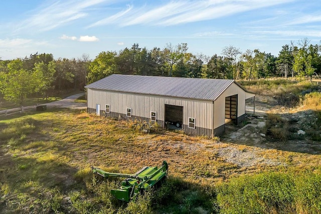 view of outbuilding with a garage