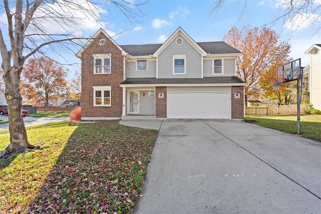 front of property featuring a garage and a front yard