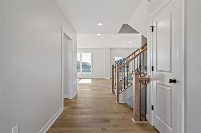 hallway with light wood-type flooring